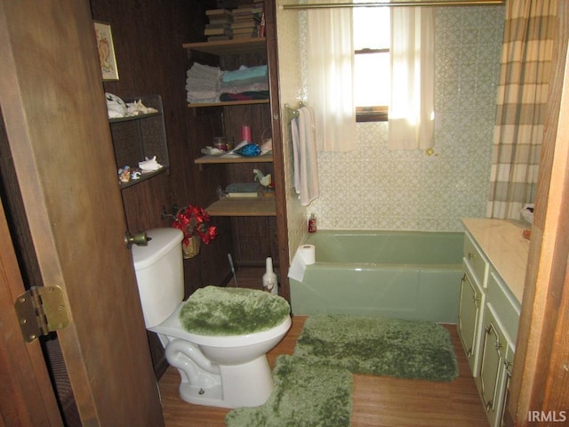 full bath featuring vanity and toilet