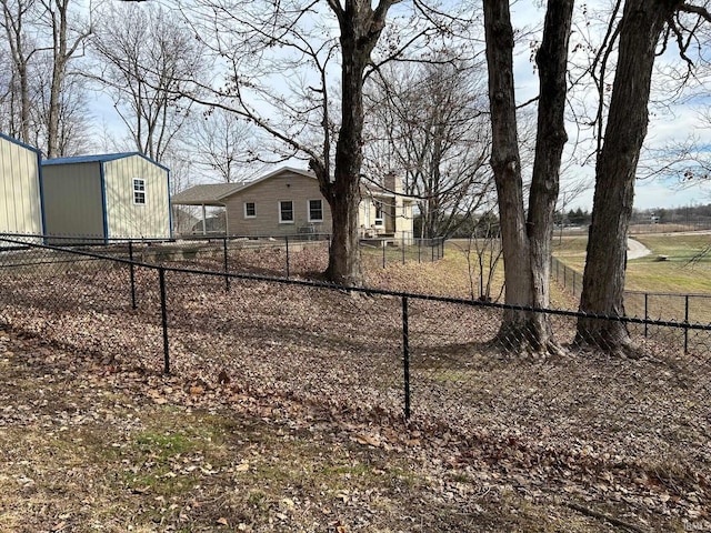 view of yard with an outdoor structure