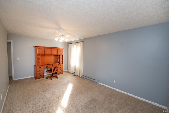 unfurnished bedroom featuring baseboard heating, ceiling fan, light carpet, and a textured ceiling