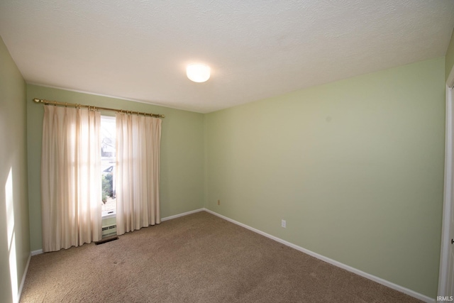 unfurnished room with carpet