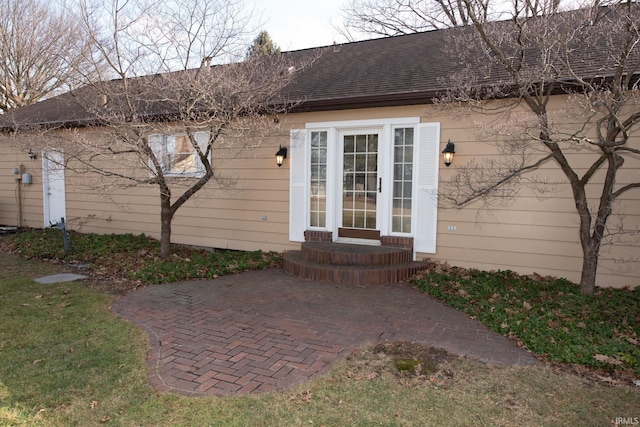 property entrance with a patio area