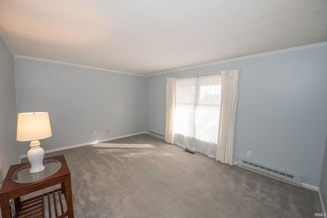 carpeted spare room with a baseboard radiator, crown molding, and a textured ceiling