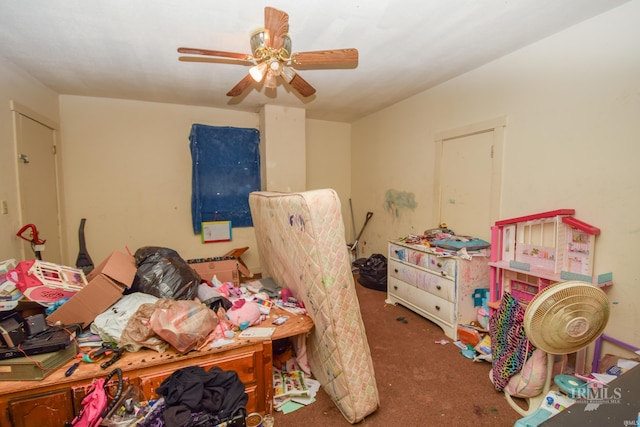 bedroom with ceiling fan and carpet