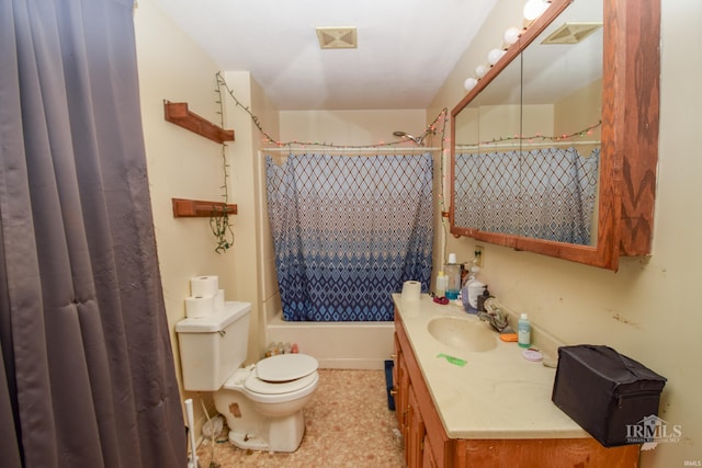 full bathroom featuring vanity, shower / tub combo, and toilet