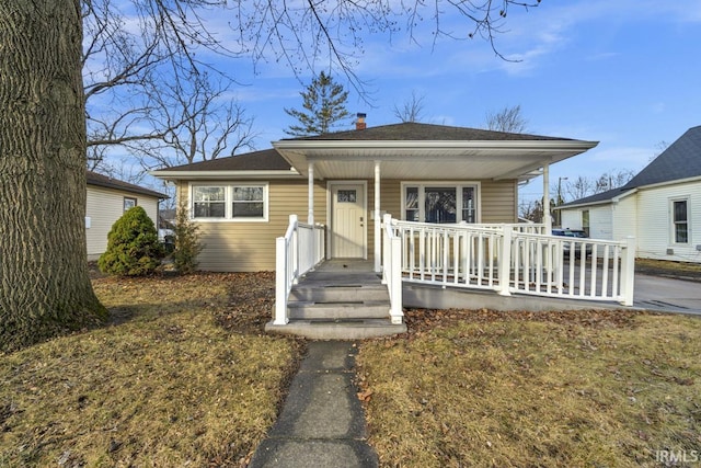 bungalow-style home with a porch