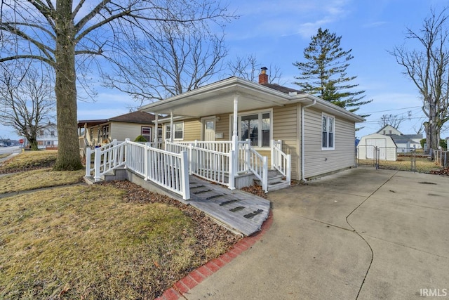 view of front of property with a front lawn and a porch