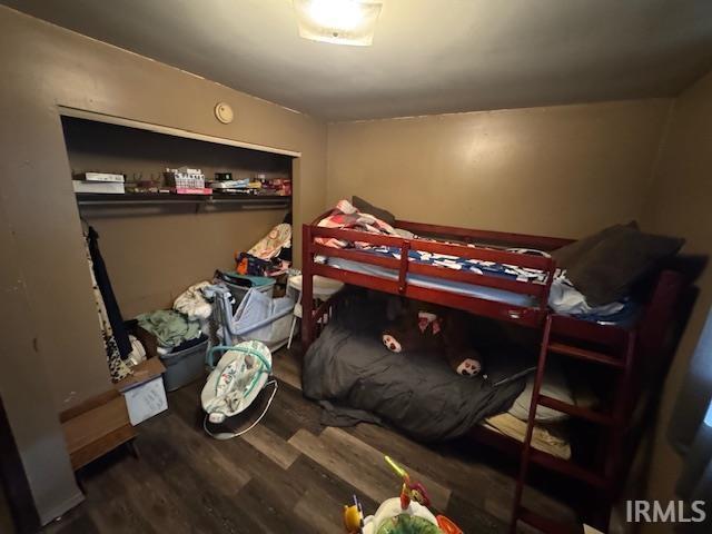 bedroom featuring hardwood / wood-style floors