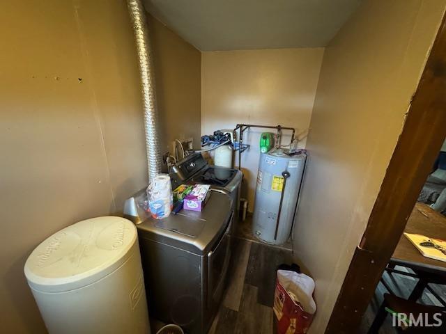 utilities featuring water heater and washer and dryer