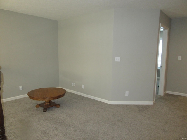 unfurnished room featuring carpet floors