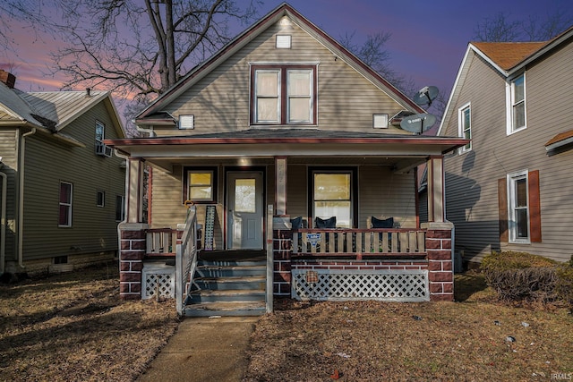 view of front of property featuring covered porch