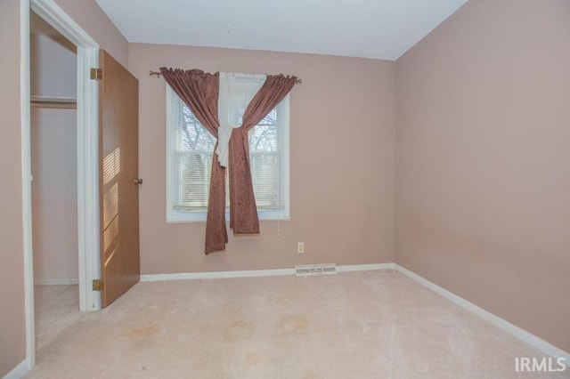 view of carpeted spare room