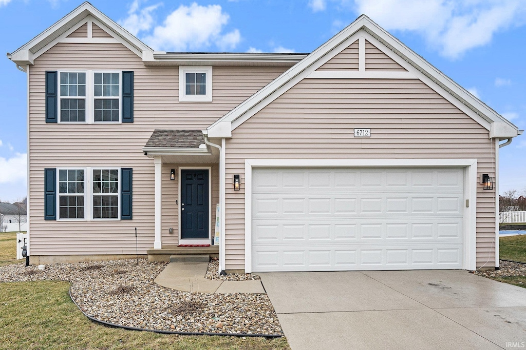 view of front of home with a garage