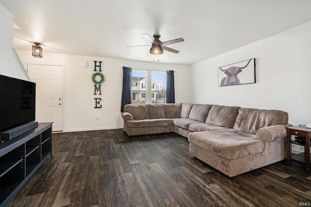 living room with dark hardwood / wood-style floors and ceiling fan