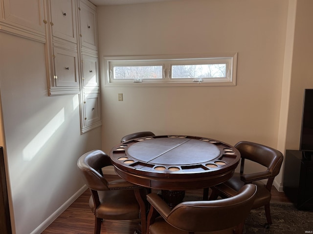 game room with dark hardwood / wood-style flooring