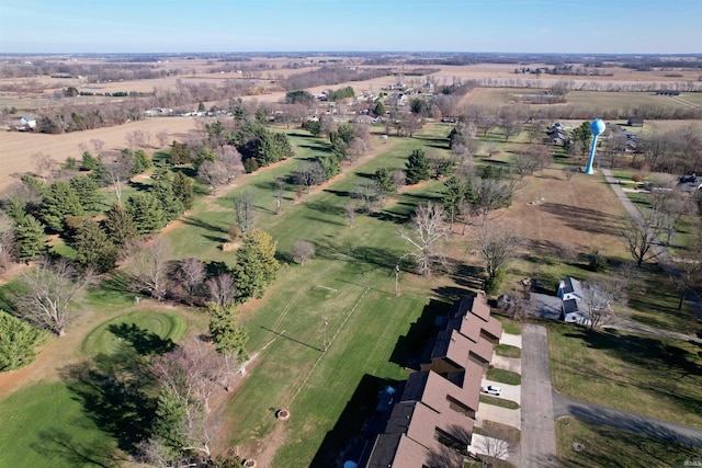 birds eye view of property with a rural view