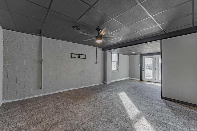 interior space with carpet flooring and a drop ceiling