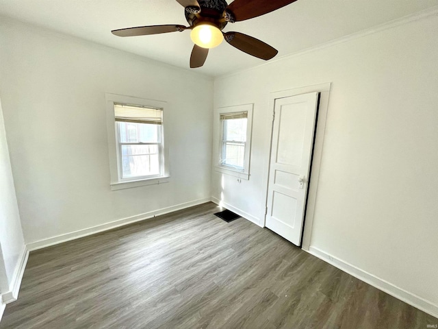 unfurnished bedroom featuring hardwood / wood-style flooring and ceiling fan