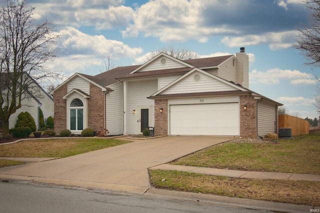 view of front of house with central AC unit and a front yard