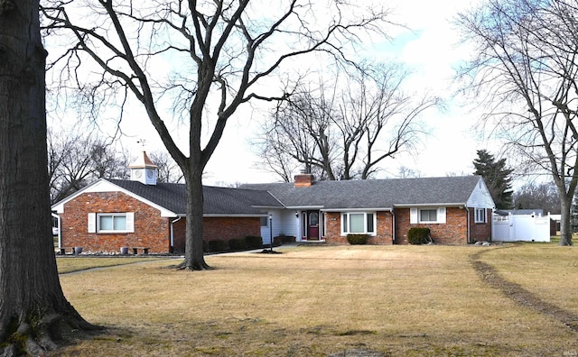 ranch-style house with a front yard