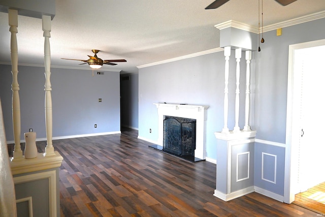 unfurnished living room featuring crown molding, ceiling fan, and dark wood-type flooring