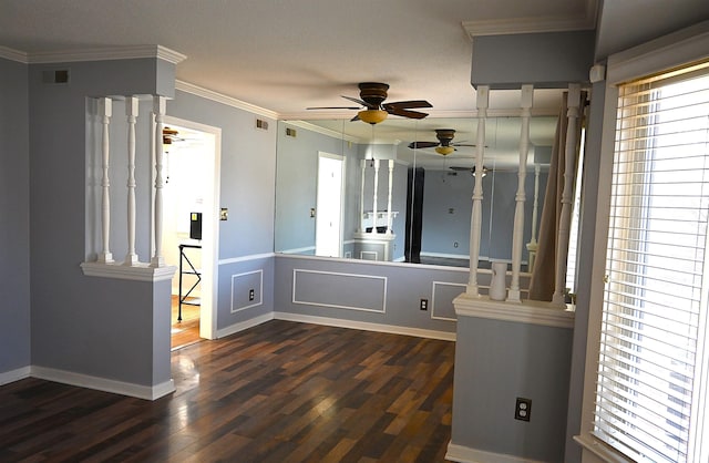 interior space with wood-type flooring, ornamental molding, and ceiling fan