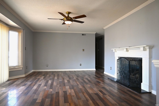 unfurnished living room with crown molding, dark wood-type flooring, a textured ceiling, and ceiling fan