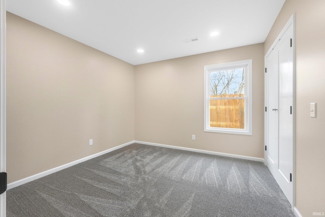 view of carpeted spare room