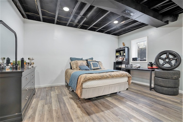 bedroom featuring light wood-type flooring