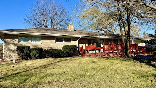 exterior space featuring a yard and a deck