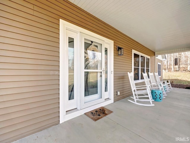 doorway to property featuring a porch