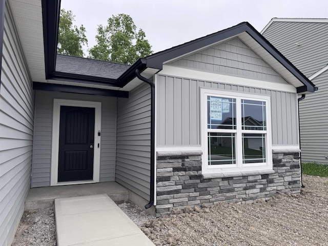 14812 Verona Lakes Psge, Fort Wayne, IN 46814 - property entrance with stone siding and board and batten siding