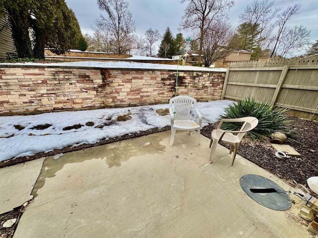 view of snow covered patio