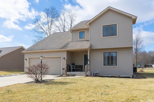 view of front of home featuring a garage and a front yard