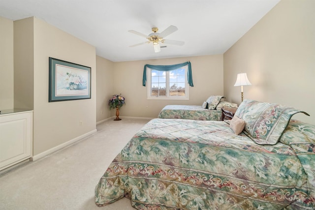 bedroom with light colored carpet and ceiling fan