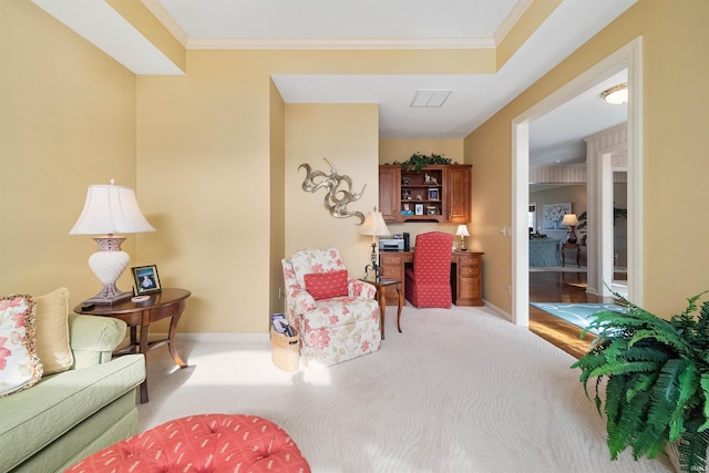 living room featuring ornamental molding and light carpet