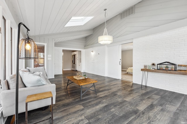 living room with lofted ceiling with skylight, brick wall, dark wood-type flooring, and wood ceiling