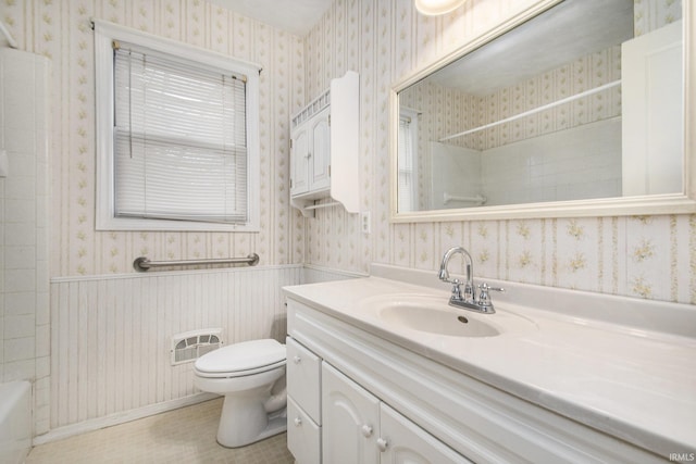 full bathroom with vanity, bathtub / shower combination, and toilet