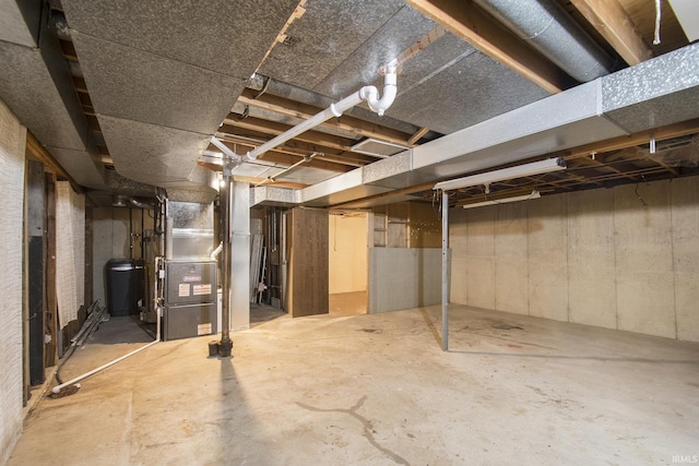 basement featuring heating unit