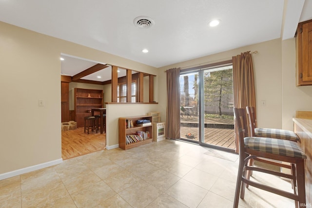 interior space featuring light tile patterned floors