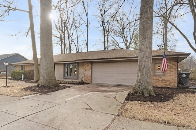 ranch-style house featuring a garage