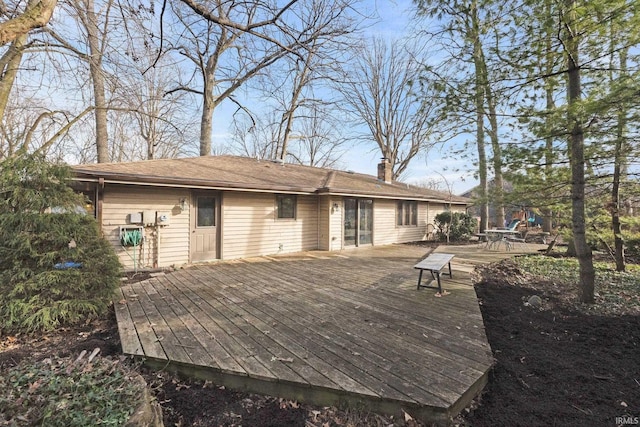 exterior space featuring a wooden deck