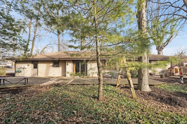 rear view of property featuring a patio