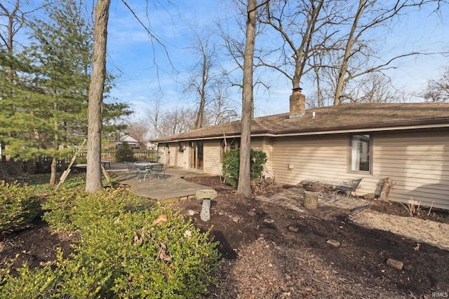 rear view of property with a patio area