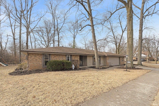 single story home featuring a garage