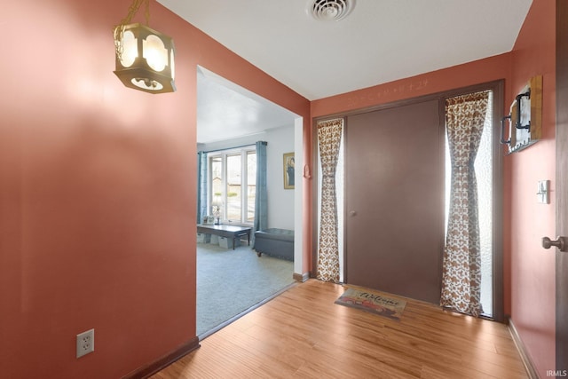 entrance foyer with hardwood / wood-style flooring