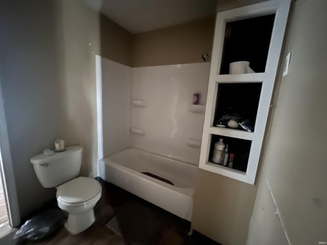 bathroom with walk in shower and toilet