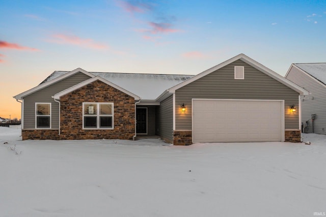 ranch-style house featuring a garage