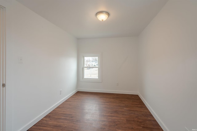 empty room featuring dark hardwood / wood-style floors