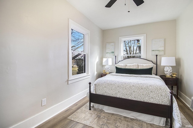 bedroom featuring hardwood / wood-style floors and ceiling fan