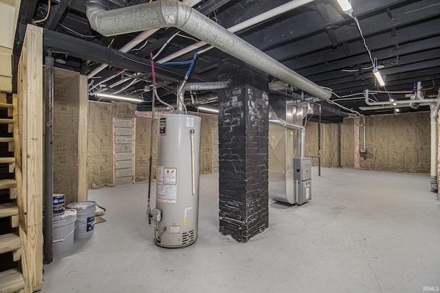 basement with gas water heater and heating unit